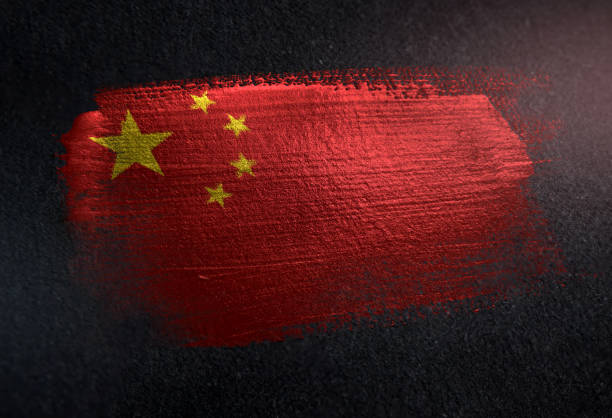 china flag made of metallic brush paint on grunge dark wall - chinese flag imagens e fotografias de stock