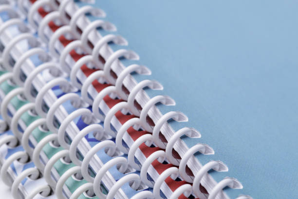 Stack of used notebooks on a white background
