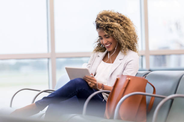 istock Confident business traveler waiting for flight 1022880302