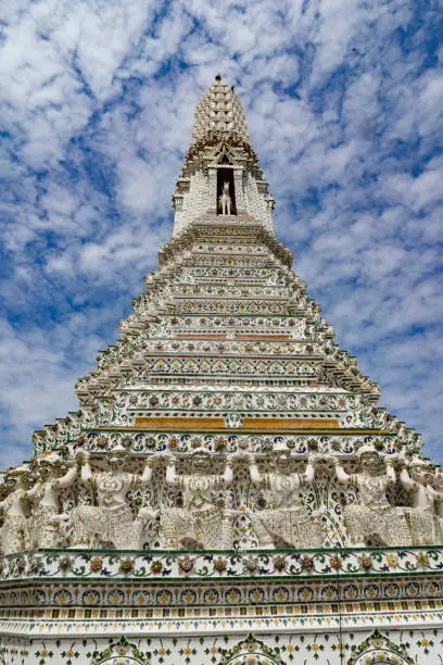 The Temple of Dawn, prang of Wat Arun Ratchawararam in beautiful blue sky