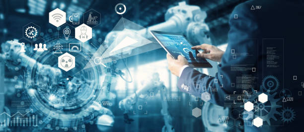 manager tecnico ingegnere industriale che lavora e controlla la robotica con software di sistema di monitoraggio e connessione di rete del settore delle icone su tablet. ai, intelligenza artificiale, automazione robot arm machine in smart factory su sfondo - business planning leadership organization foto e immagini stock