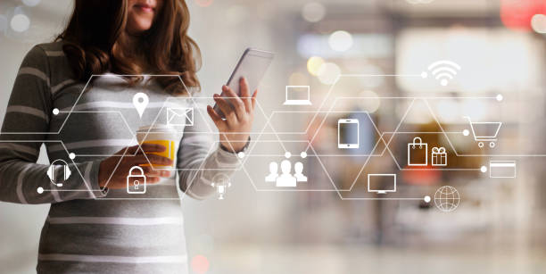 istock Woman using mobile payments online shopping and icon customer network connection. Digital marketing, m-banking and omni channel. 1022892542