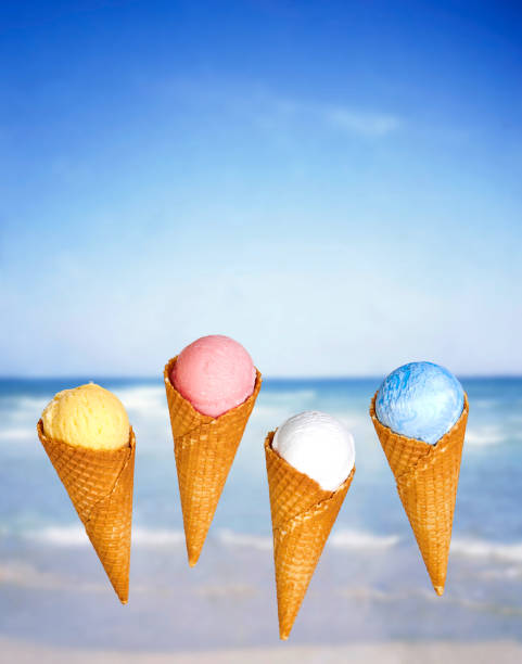 istock Ice cream cones on blue beach background 1022910488