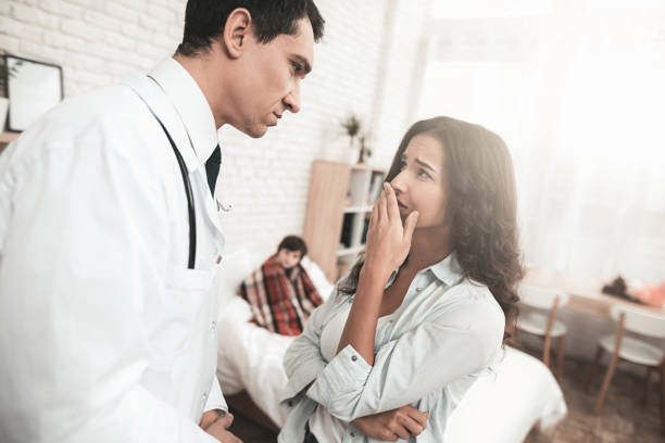 istock Arabian Doctor Consulting A Sick Child Parent. 1022912270