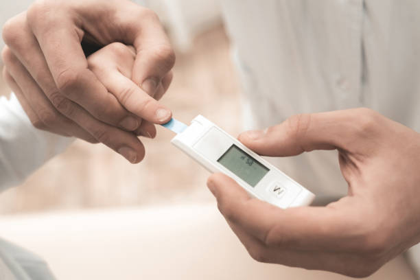 istock Arabian Doctor Is Making Sugar Test To Child. 1022916900
