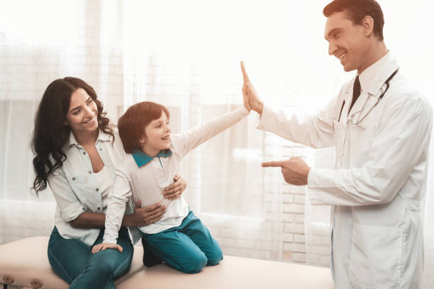 istock Arabian Doctor Is Giving A High Five To The Kid. 1022917052