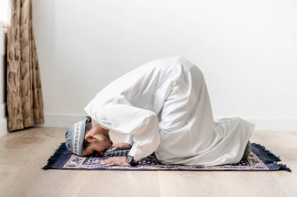 istock Muslim boy praying in Sujud posture 1022920032