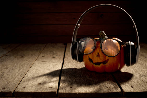 istock jack o lantern with headphones and spectacles 1022920240