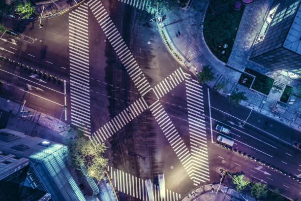 istock Aerial drone view on city intersection during night 1022921618