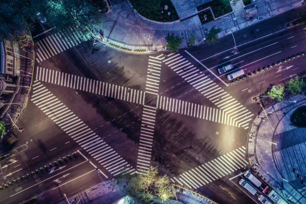 istock Aerial drone view on city intersection during night 1022921650