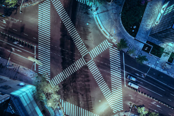 istock Aerial drone view on city intersection during night 1022921652