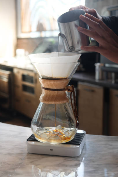 istock Barista man making drip coffee show in coffee shop 1022931276
