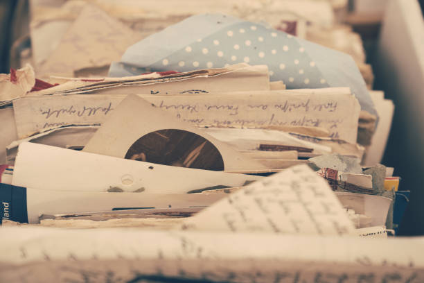 istock Old letters and photos in a box 1022932862