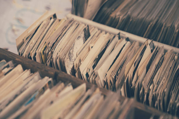istock Old letters and photos in a box 1022932876