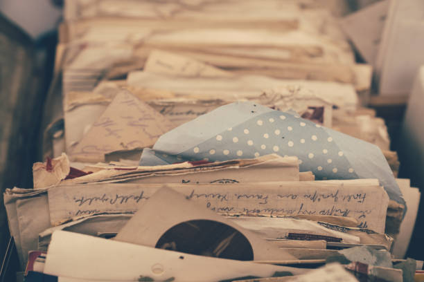 istock Old letters and photos in a box 1022932910