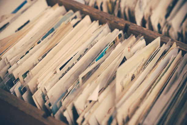 istock Old letters and photos in a box 1022932930