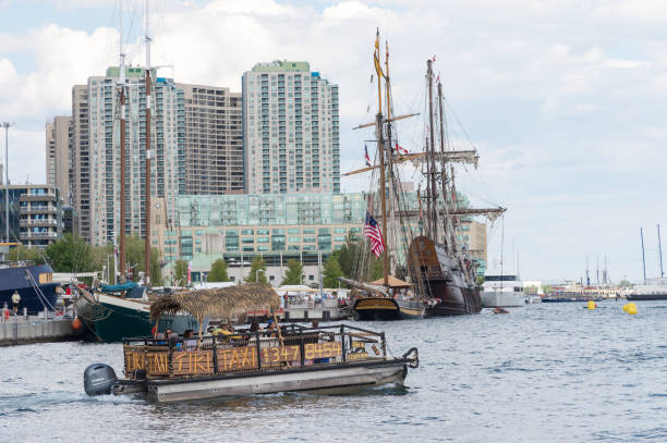 A morning view of the Toronto Harbourfront Centre area.  This district attracts downtown residents and tourists to its many attractions, events, beautiful waterfront, bars, restaurants and shops.