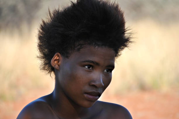 Kalahari, Namibia - Jan 24, 2016: Portrait of the woman from bushmen tribe. The San people, also known as Bushmen are members of various indigenous hunter-gatherer peoples of Southern Africa