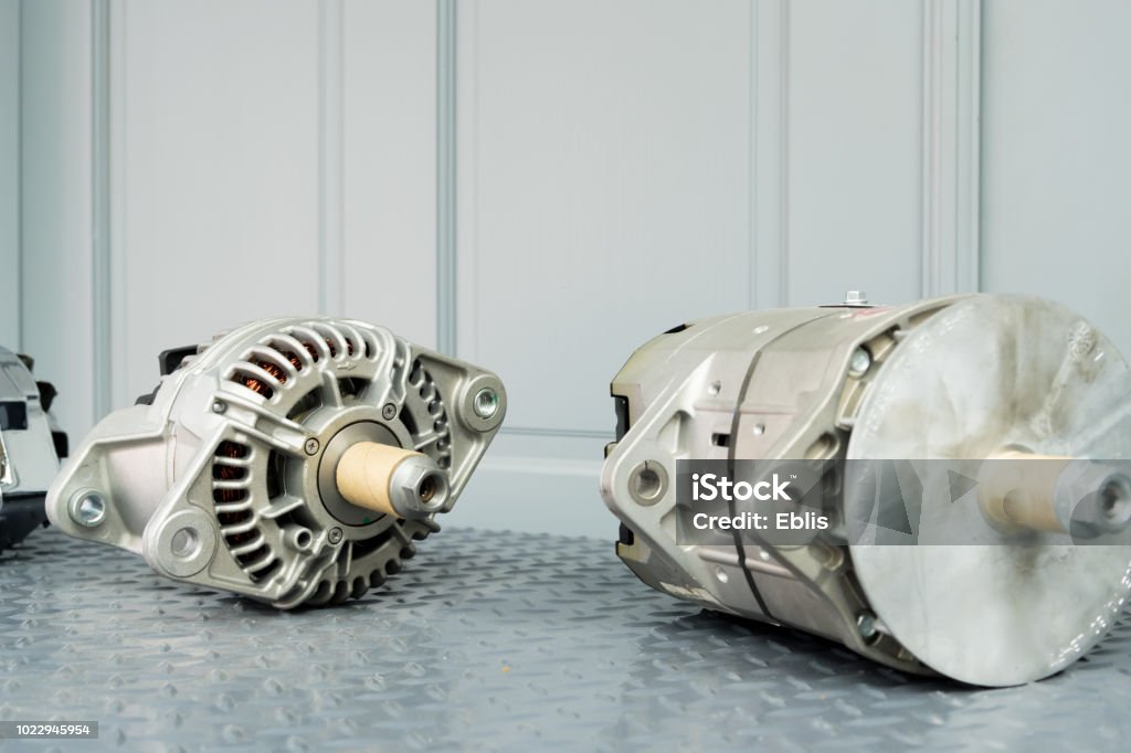 Car alternators on display on metal shelf/auto parts Car Stock Photo