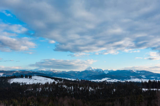 istock Evening winter cloudy day mountain ridge 1022960984