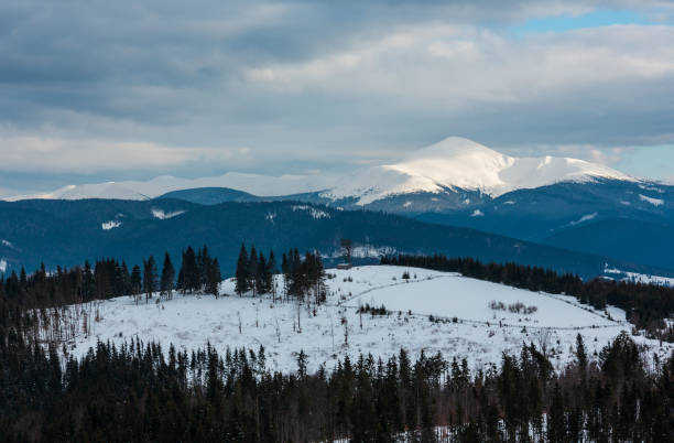 Evening winter cloudy day mountain ridge