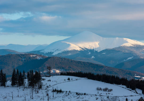 istock Evening winter cloudy day mountain ridge 1022963946