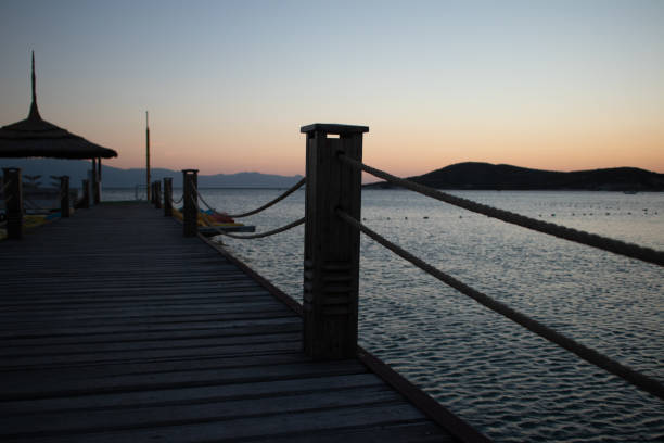 istock Wooden pier during a summer sunset 1022964158