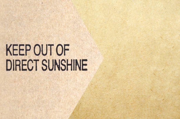 istock Cardboard with keep out of direct sunshine word 1022964842