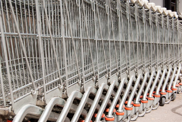 istock Row of metal shopping carts 1022968218