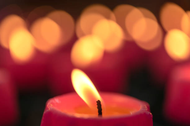 istock Flower candles burning at night. 1022969986
