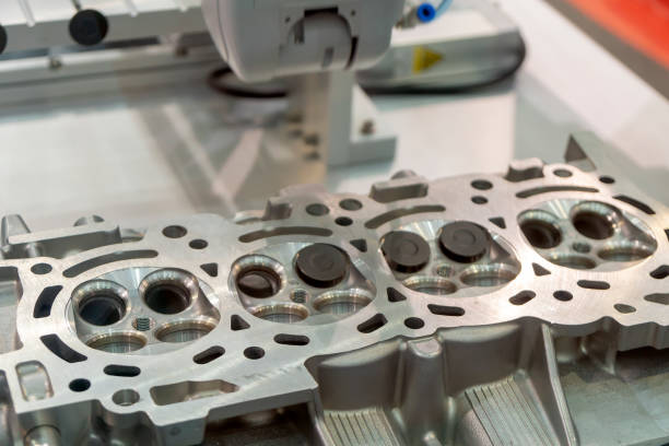 istock The boring machine make the hole at the cylinder head . 1022972244
