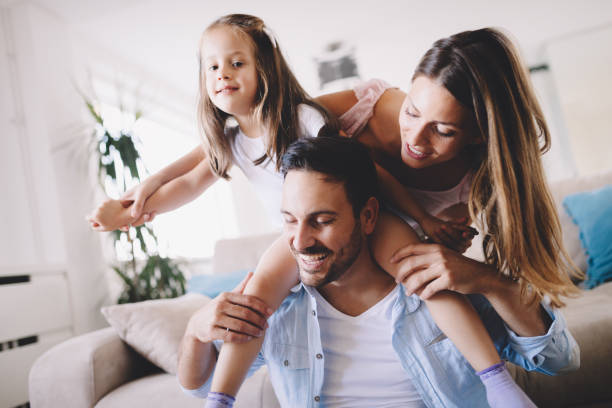 istock Happy family having fun times at home 1022981132