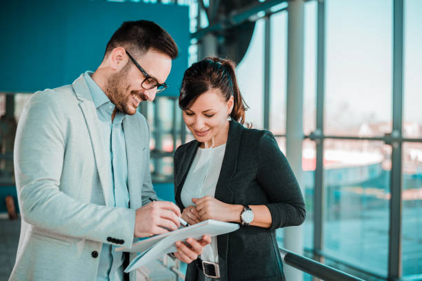 istock Confident business partners talking in an office building. 1022990984