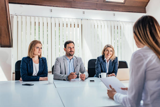 istock Woman having a job interview with HR specialists. 1022991392