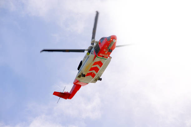 irish coastguard rescue helicopter searching stock photo