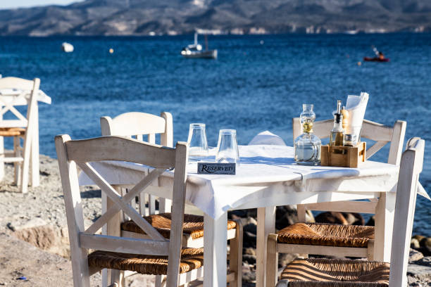 istock Reserved table in a romantic restautant near the ocean 1022996220