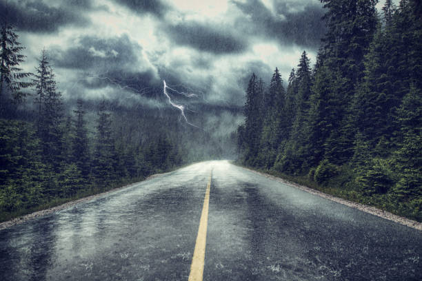 storm with rain and lightning on the street - trovão imagens e fotografias de stock