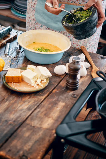 istock Preparing Frittata with Green Asparagus, Peas and Parmesan 1023004122