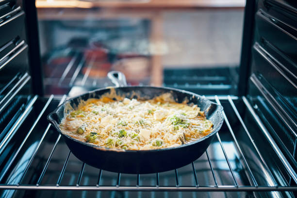 istock Preparing Frittata with Green Asparagus, Peas and Parmesan 1023004270