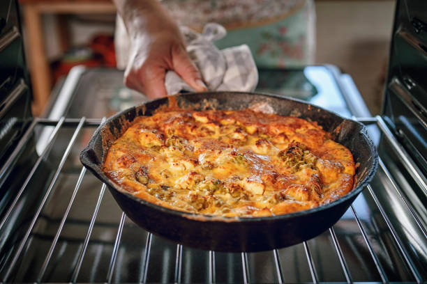 istock Preparing Frittata with Green Asparagus, Peas and Parmesan 1023004300