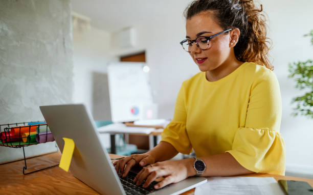 istock Businesswoman using laptop in the office 1023006988