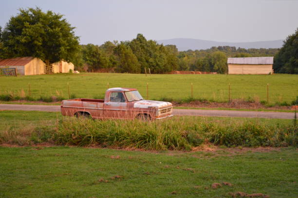istock Old farm truck at sunset. 1023007008