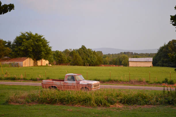 istock Old farm truck at sunset. 1023013382