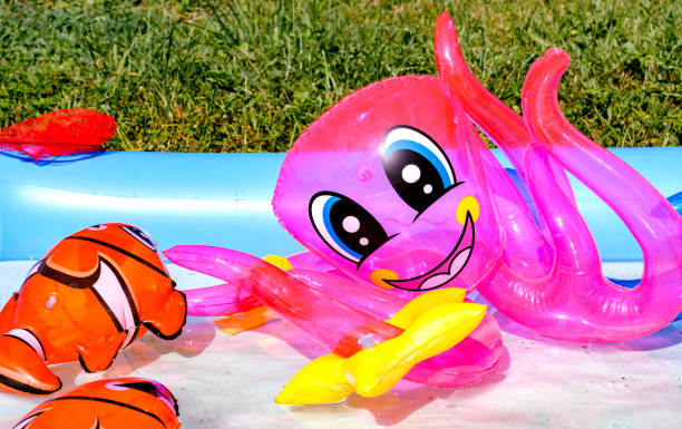 istock Inflatable pool with children's toys 1023016626