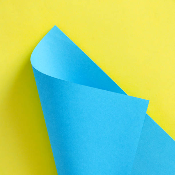 istock Blue and yellow paper 1023019474