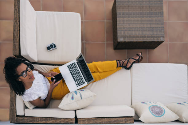istock Woman working from home at the yard on her computer 1023022192