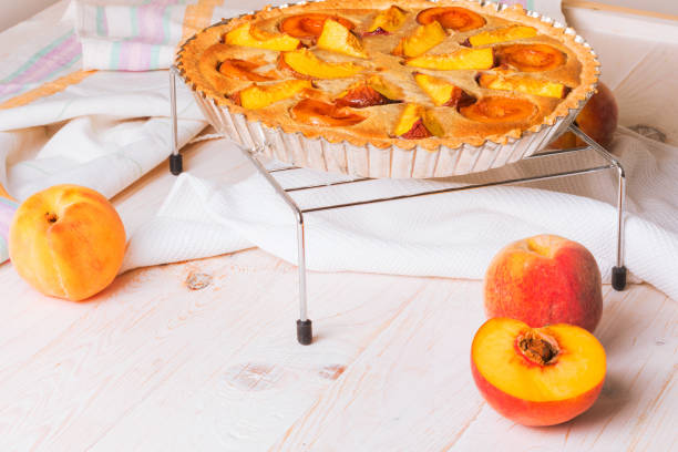 istock Peach pie in almond cream 1023026064