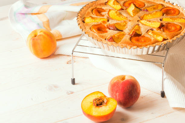 istock Peach pie in almond cream 1023026200