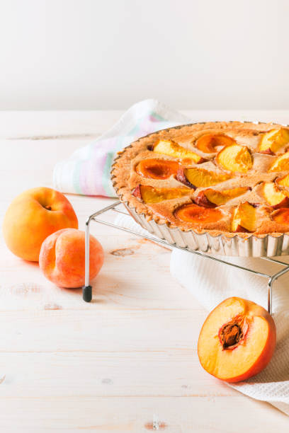 istock Peach pie in almond cream 1023026394