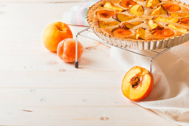 istock Peach pie in almond cream 1023026536